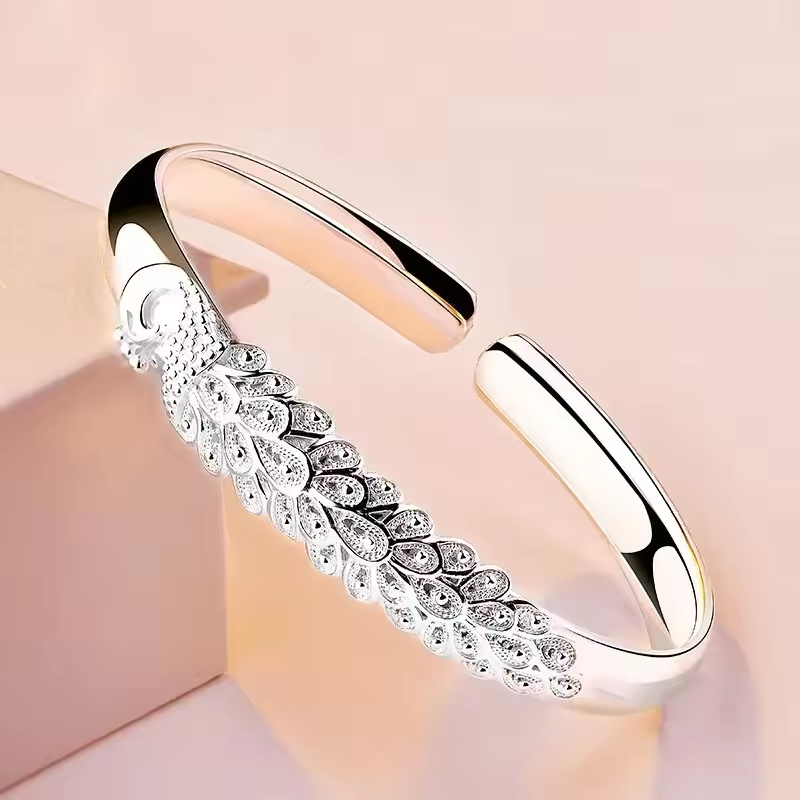 Pavora™ – Peacock Feather Cuff Bracelet