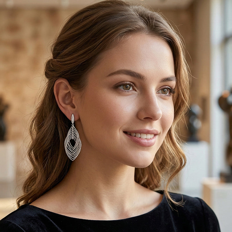 Lumivra™ – Cascading Silver Leaf Earrings